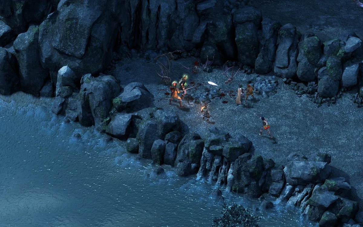 Pillars of Eternity – drużyna walcząca ze żmijami na skalistym brzegu